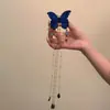 Pasador de Pelo con Borla de Resina de Mariposa Tejida Estilo de Lujo Ligero Retro de Gama Alta Pinza de Pato Moda Súper Hada Temperamento Accesorios para el Cabello Venta al por Mayor