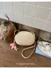 Bolso Ovalado de Diseño de Nicho Transfronterizo para Mujer, Nuevo Bolso de Hombro Cruzado Versátil y Moderno para Viajar, Bolso de Teléfono de Moda