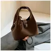 Bolso Cubo de Moda Tendencia Casual Simple Único de Nicho 2025 Nuevo Vintage Elegante para Mujer con Textura Bolso de Hombro