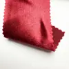Tejido de satén elástico, grueso y brillante con una caída suave, que presenta un efecto reluciente de seda artificial, adecuado para disfraces de baile y ropa formal.
