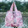 2025 Nueva Bolsa de Compras Plegable Tela Floral Portátil Poliéster Tote Bolsa de Almacenamiento Gran Capacidad Bolsa para la Compra del Supermercado Venta al por Mayor