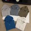 2026 Otoño Temprano Tejido de Gofre / Estilo Perezoso Retro Coreano Sudadera con Capucha de Punto de Doble Cremallera Suéter de Color Sólido Abrigo