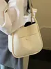 Bolso cruzado casual de diseño de nicho de moda transfronterizo, patrón simple de lichi, bolso de alta gama para madre e hija para ir al trabajo, bolso cruzado versátil