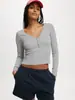Camiseta de manga larga ajustada de color liso con cuello en V, jersey para mujer, de otoño, nueva, transfronteriza de Amazon Europa y América, con botones en la espalda, para mostrar el ombligo