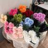 Ramo de Flores Artificiales de 7 Cabezas de Venta Caliente Transfronteriza Flor de Seda de Fragancia Oscura Caléndula Decoración Suave para el Hogar Fila de Flores para Boda Flor