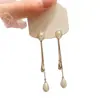 Pendientes vintage de plata con aguja francesa, borla de gota de agua y perla, pendientes de moda de alta gama de nicho para mujer