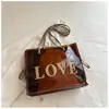 Bolsa de Ombro de PVC com Letras da Moda Europeia e Americana, Versátil para Uso Diário, Bolsa de Mão Grande Capacidade para o Dia a Dia, Bolsa Tote com Forro de Cordão