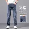 Jeans retos de caimento solto para primavera e outono para homens, nova coleção 2026, calça masculina azul-acinzentada casual e moderna, novo estilo de outono