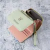 Cartera Pequeña de Mujer Transfronteriza Cuero Nuevo Monedero de Mano Cremallera Dos en Uno 70% de descuento Portatarjetas Bolsa de Almacenamiento Integrada