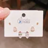 Lote 26 de Pendientes de Cobre Chapado en Oro con Circonitas, Tres Pares en un Set, Artículo Popular Transfronterizo, Pines de Plata, Set de Seis Piezas en una Tarjeta