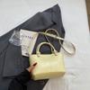 Bolso de Mano Pequeño de Moda 2025 Nuevo Textura Retro Cuero Aceitoso Color Puro Bolso Cubo Cruzado de Hombro para Viajes Diario para Mujer