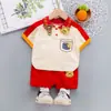 Comércio Exterior Roupas Infantis 2026 Verão Novo Estilo Conjunto Curto Infantil para Meninos e Meninas Desenho Gola Lapela Casual Roupas Infantis Conjunto de Duas Peças