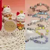 Colgante pequeño de oro puro 999 "Te amo por diez mil años", serie Labubu, con cordón para colgar, un regalo promocional para tiendas de oro
