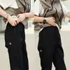 Conjunto de Calça e Jaqueta Softshell de Inverno 2025 para Homens e Mulheres, Calça Casual com Forro de Fleece e Logo Triangular, Calça Longa Reta que Afina, Levemente Afunilada