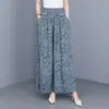 Novas calças de algodão e seda estampadas de perna larga para verão para mulheres de meia-idade e idosas, corte solto, plus size, calças casuais que emagrecem