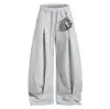 Pantalones Deportivos Casuales Oreeta de Estilo Americano Minimalista con Dobladillo Curvo para Hombres y Mujeres con Colgante de Felpa de Dibujos Animados, Pierna Ancha Holgada