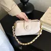 Bolsa transfronteiriça feminina japonesa coreana mini pequena bolsa de clipe feminina 2026 novo estilo moda médica ombro único bolsa de celular tb