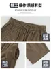 Pantalones de cuadros grises de pierna ancha para mujer, nuevo estilo otoño 2026, de cintura alta, adelgazantes, estilo coreano, casual, fluidos, pantalones de pierna curva