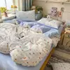 Nuevo juego de cuatro piezas jacquard teñido en hilo de alto peso, estilo simple y fresco, ropa de cama estilo princesa de lujo ligero