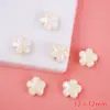 Color flor de cinco pétalos cerámica cuentas sueltas Macaron lindas cuentas perforadas pulsera collar DIY accesorios al por mayor