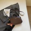 Bolso de mano con textura color vino popular este año, bolso cruzado, bolso cuadrado pequeño casual popular de moda para mujer