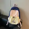 Mochila de nicho muy elegante para niñas, nuevo modelo 2026, mochila escolar versátil con bloques de color para estudiantes de secundaria y universitarios