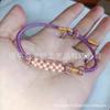 Pulsera Tejida a Mano de Flor de Durazno de Ocho Hilos con Nudo de Flor de Durazno Se Puede Usar con Oro Jade Ámbar Cera de Abeja Venta Directa de Fábrica Mayorista