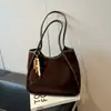 Nova Moda Retro Outono 2025 Bolsa Estilo Ocidental Bolsa de Ombro Casual Feminina Bolsa Tote Transversal para o Trabalho