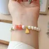 Pulsera elegante de doble círculo de jade y cristal de perla de marea nacional, pulsera de personalidad de nicho, pulsera de moda de alta sensación, venta al por mayor para mujeres