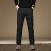 Ropa de Hombre Fengshe / 2026 Otoño-Invierno Nuevo Algodón Elástico Versátil Ligero Negocio Recto Delgado Casual Pantalones Largos para Hombre
