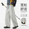 Pantalones casuales nuevos de otoño con cordón en la cintura elástica, pierna ancha, corte relajado, talla grande, pierna recta, pantalones largos modernos para exteriores para hombre