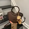 Bolsa de Mão Estilo Cesta de Nicho Transfronteiriça para Mulheres, Bolsa Saco Versátil de Alta Qualidade, Nova Bolsa Versátil Elegante de Ombro e Transversal