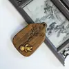 Bodhisattva Kinnamoroll Madera de Agarwood Madera Preciosa Colgante Relieve Unilateral Artesanía Tallado Fino Adorno Cadena para Suéter