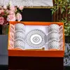 Juego de Tazas de Café de Cerámica de Lujo Ligero, Juego para el Té de la Tarde Estilo Británico para el Hogar, Juego de Regalo de Taza y Platillo Naranja de Alta Estética, Transfronterizo