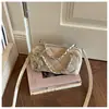 Bolso pequeño retro con patrón de diamantes transfronterizo para mujer, nuevo bolso tipo almohada de alta gama, bolso de hombro y bandolera de diseño nicho, moderno