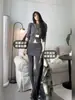 Falda Corta Gris Bodycon Falda Larga de Lana Falda Interior Estilo Coreano para Mujer Otoño 2026 Nueva Adelgazante