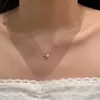 Collar delicado de perla y circonita cúbica para mujer, una cadena de clavícula ligera, lujosa y versátil adecuada para el uso diario y los desplazamientos, disponible para venta al por mayor y envío directo