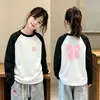 Roupa de baixo feminina com forro de fleece, novo estilo outono/inverno 2026, roupa íntima quente para estudantes, blusa de manga comprida com gola redonda para meninas, disponível nos tamanhos M e G