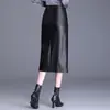Falda midi con abertura irregular para mujer, nueva otoño/invierno 2026, falda de cuero PU de cintura alta adelgazante, elegante y simple, moderna
