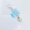 Nuevo colgante corto de perla con lazo de color caramelo, accesorio para teléfono móvil, colgante para bolsa de auriculares, regalo para novias