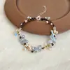 2025 Pulsera Estilo Mori Estilo Fresco Cuerda de Mano Tejida Mariposa Flor Dulce Pulsera Sencilla Versátil Primavera/Verano Distintiva