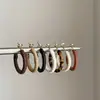 Aretes Redondos Envueltos en Cuero de Aguja Plateada, Aros Artísticos Retro Simples, Pendientes de Lujo Ligero de Moda de Alta Gama al por Mayor para Mujer