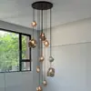 1. Especialmente diseñado para escaleras dúplex de estilo cubo de hielo transfronterizo, candelabro de 10 escalones, lámpara de techo estilo grafiti, candelabro grande, sala de estar tipo loft con techos altos