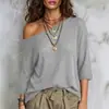 Roupas Femininas Europeias e Americanas Transfronteiriças Amazon TK Feminino Novo Gola Redonda Ombro Assimétrico Casual Solto Vazado Manga de Cinco Pontos Tricô