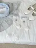 Calcetines finos de mujer serie azul y blanco para primavera y verano con lazos de cinta blanca, bordado de oso y diseño de malla calada