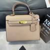 Bolso de Mano Kelly Naranja 2026 Modelo Nuevo Moda Retro Europea y Americana para Mujer Segunda Generación Mini Venta Directa de Fábrica Transfronterizo