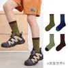 1690 Calcetines Infantiles al por Mayor Otoño Nuevo Color Bloque Geométrico Bebé Caña Media Calcetines de Algodón para Niños de Moda sin Costuras