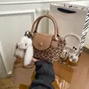 Moda Versátil Transfronteriza 2026 Nuevo Estilo Bolso Pequeño de Hombro Cruzado Estilo Cubo con Diseño de Bloques de Color Bolso de Hombro Cruzado Estilo Cubo