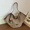 Bolso tejido a mano transfronterizo para mujer, nuevo y moderno 2026, bolso de playa de paja para primavera-verano, bolso de hombro de gran capacidad