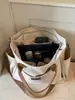 Bolso de lona vintage Shuai Mi Jia para mujer, bolso de hombro para mujer con múltiples bolsillos, adecuado para el trabajo y los desplazamientos, bolsa de almuerzo portátil, bolso cruzado casual
